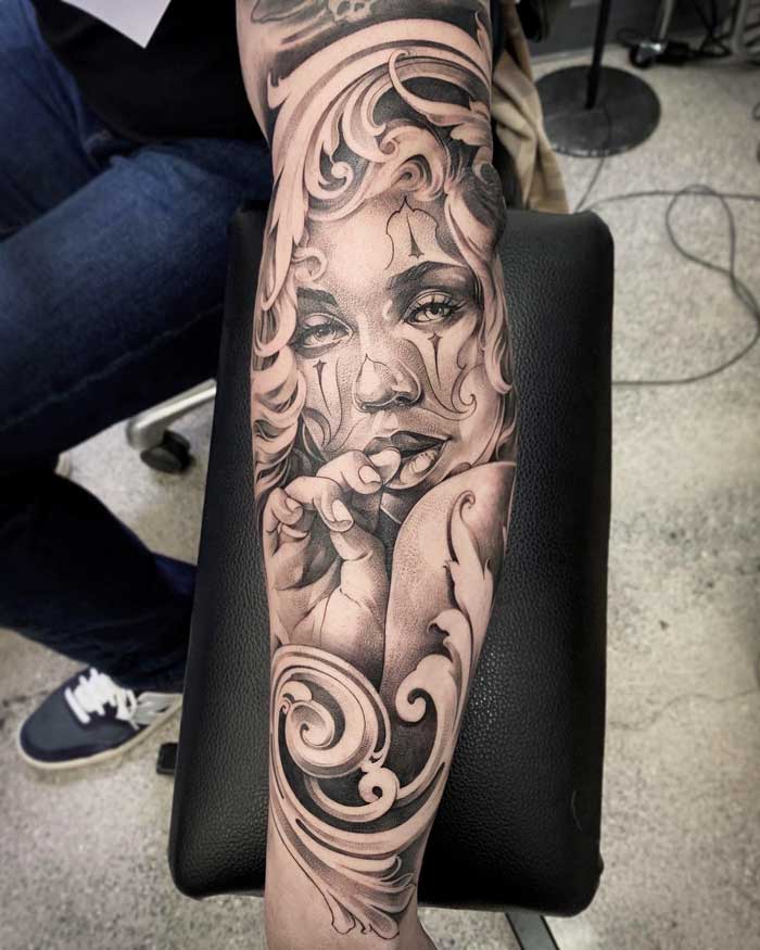 Woman on forearm tattoo by Vincent