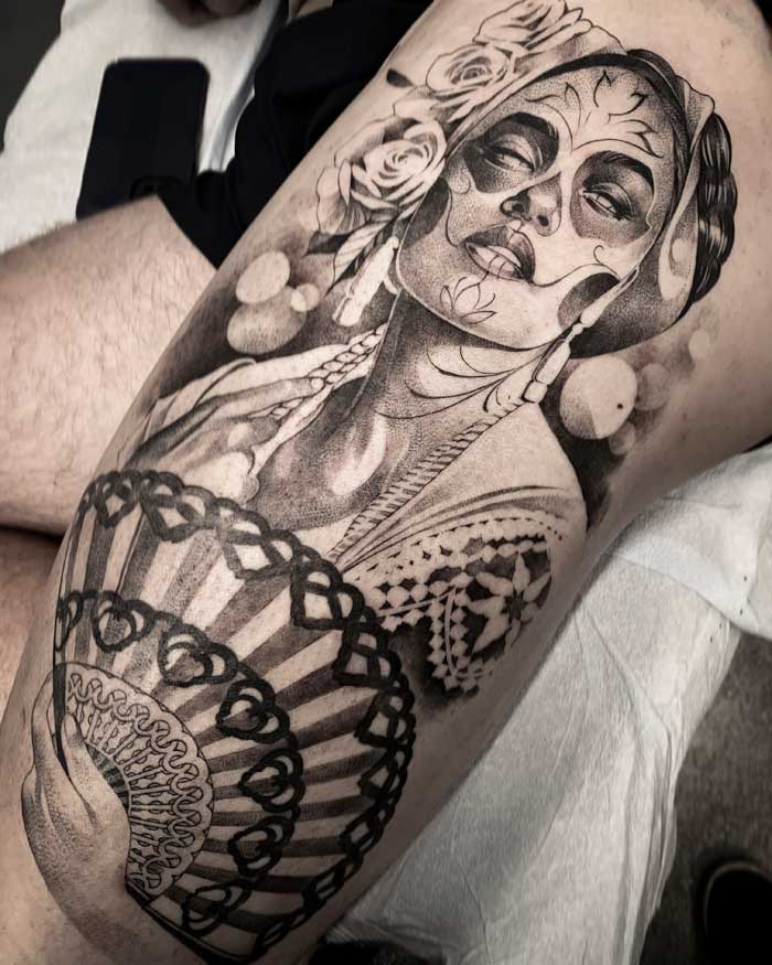 Woman on thigh tattoo by Vincent