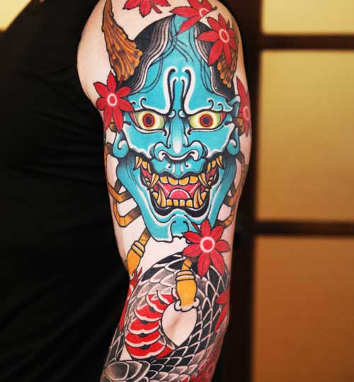 Demon arm sleeve tattoo by Hunter Schuon