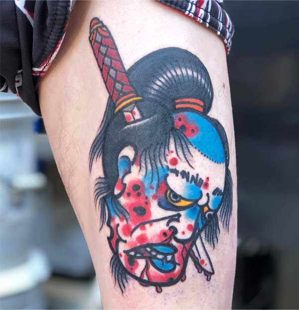 Skull & knife tattoo by Ryan Murphy