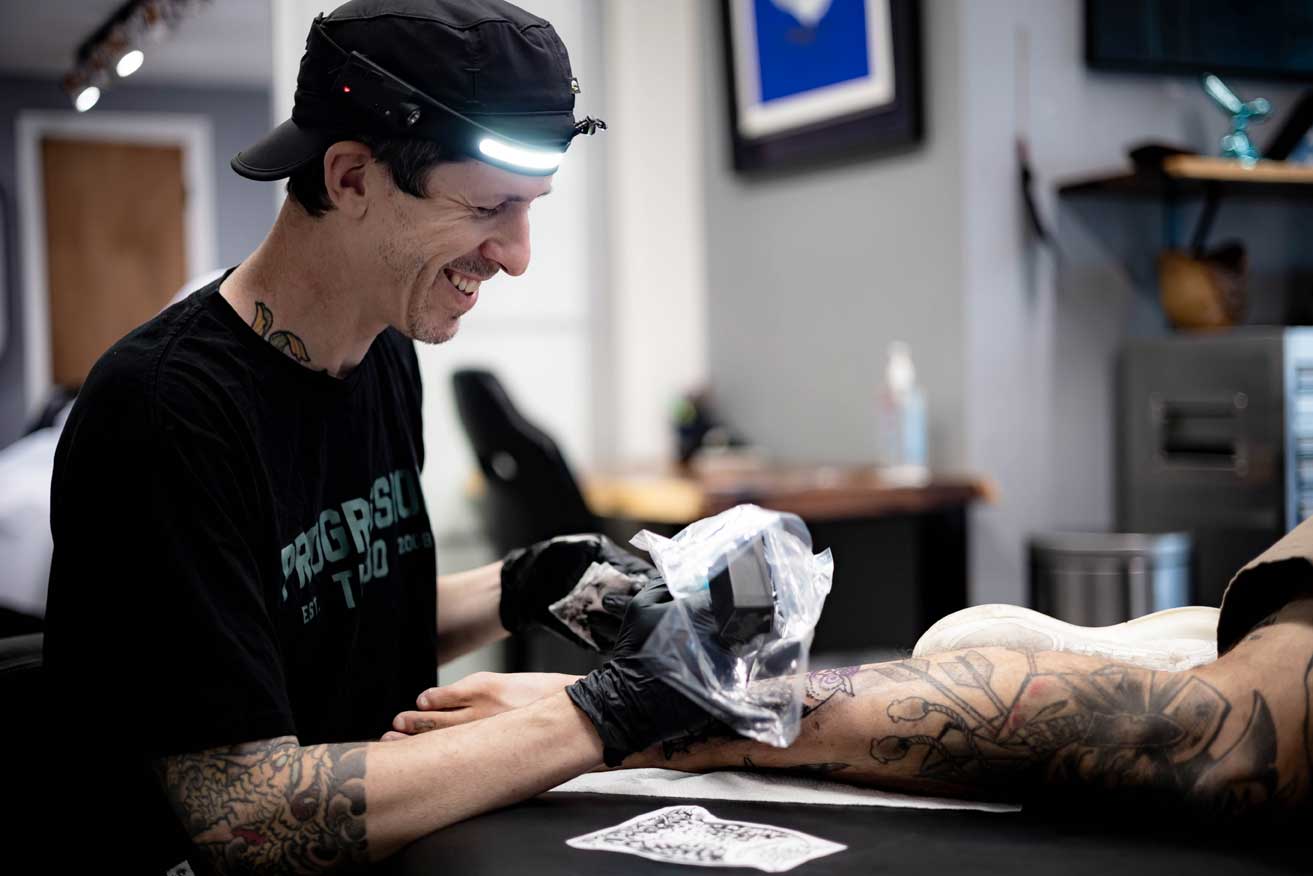 Tattoo artist Hunter Murphy at 1 Point Tattoo
